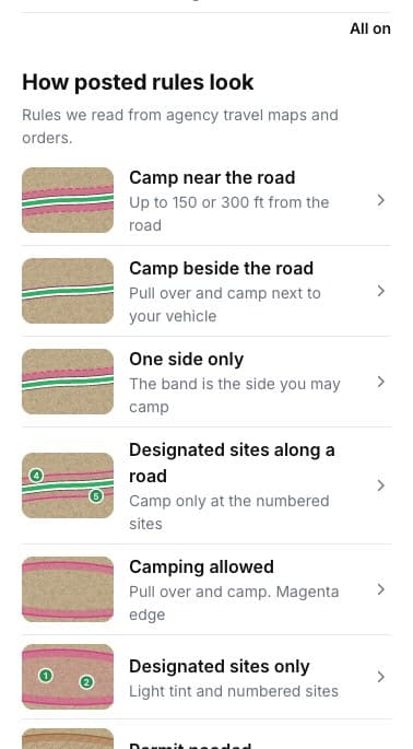 How posted rules look: camp near the road, one side only, designated sites along a road